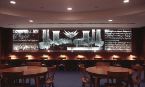 26’ long etched glass panels and furniture designed by the artist.